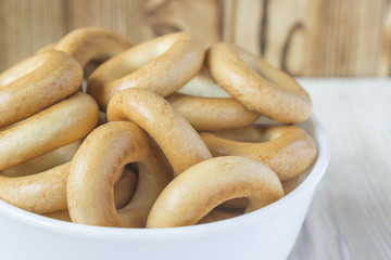Wooden rustic table with national russian bagels