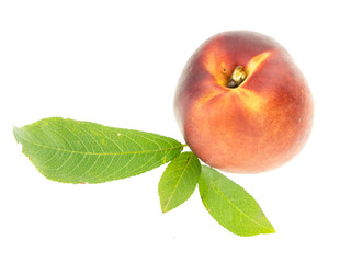 Peach with leaves, isolated on white background.