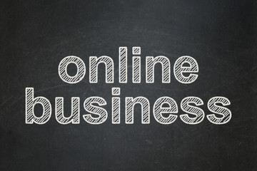 Business concept: Online Business on chalkboard background