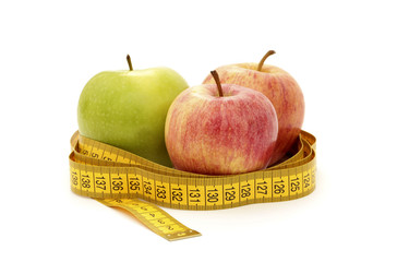 Three apples in a measure tape