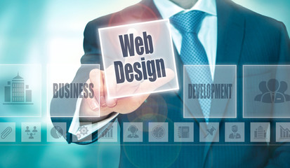 A businessman selecting a Web Design Concept button on a clear screen.