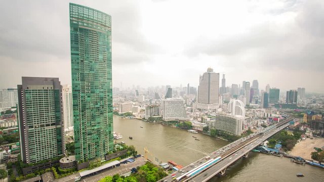Time lapse view of Bangkok, Thailand. Chaopraya river view, cloudy day.