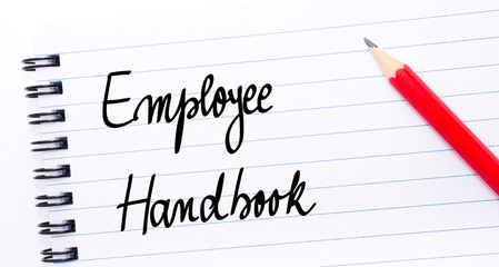 Obraz premium Employee Handbook written on notebook page