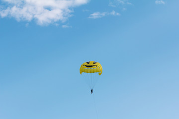 Parachuting over a sea, towing by boat
