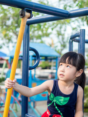 asian baby child playing on playground