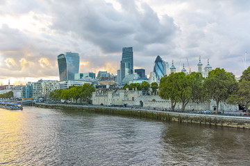 Fototapeta na wymiar Twinlight cityscape of City of London and Thames River, England, United Kingdom