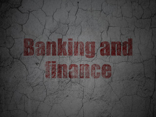 Currency concept: Banking And Finance on grunge wall background