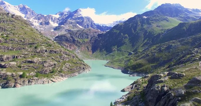 Aerial 4k - Valmalenco (IT) - Sorvolo della diga di Alpe Gera verso nord 
