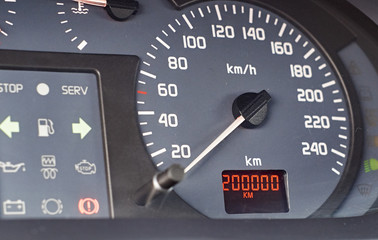 Dashboard of a car with big mileage - two hundred thousand kilometers 