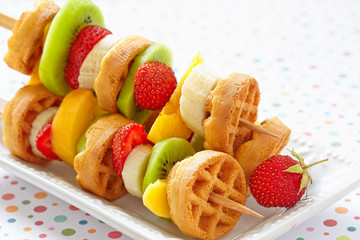 Fruit skewers on a dish