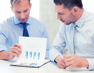 businessmen with notebook on meeting