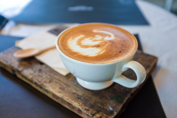Cups of coffee on the wood table