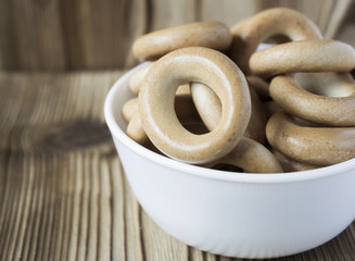 Wooden rustic table with national russian bagels