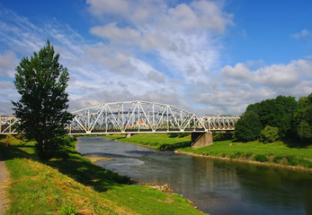 Fototapeta premium Railway bridge over San river in Przemysl, Poland