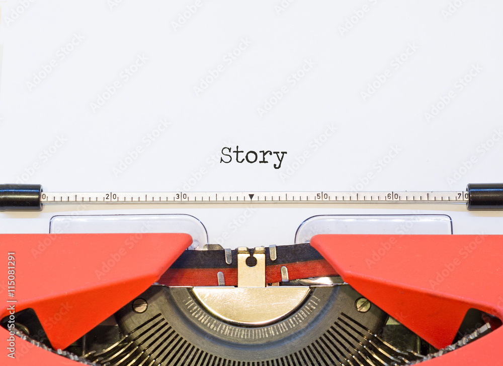 Fototapete close up image of typewriter with paper sheet and word story.