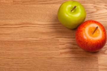 Two Apples on wooden Tabletop