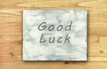 Motivational phrase note, Good Luck sign.