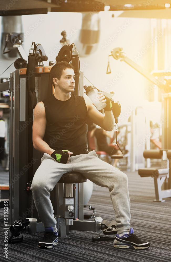 Canvas Prints man exercising on gym machine