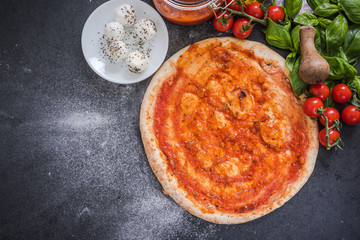 Making traditional italian pizza