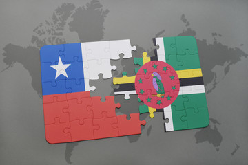 puzzle with the national flag of chile and dominica on a world map background.