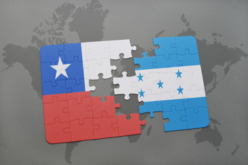 puzzle with the national flag of chile and honduras on a world map background.