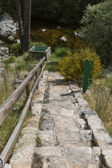 Fototapeta na wymiar stone stairway in the river to reach the registry of water 