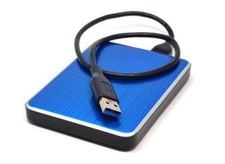 Blue external hard drive on white background