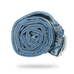 jeans twisted in roll isolated on white