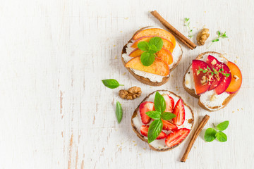 bruschetta with peaches, plums, strawberries and cottage cheese.
