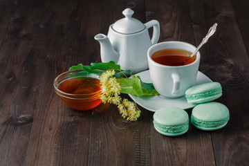 Breakfast with cookies and  tea cup an macaroon