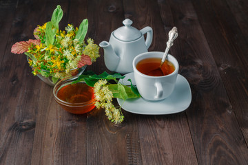 Healing tea with herbs and linden blossom