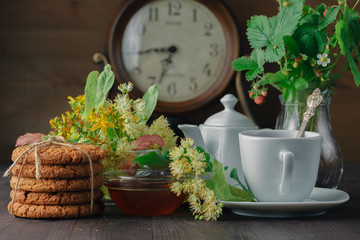Traditional linden tea, flowers and linden branches