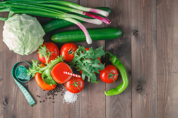 Tomato juice in glass with celery