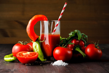 Glass of tomato juice with vegetables