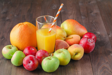 Glass of fresh cold smoothie with fresh fruit