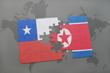 puzzle with the national flag of chile and north korea on a world map background.