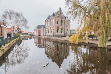 Fototapeta na wymiar Holiday in Holland - Cold raining wet winter in Volendam