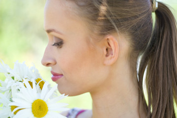 Girl with daisies