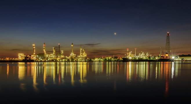 Oil refinery industry plant along twilight at morning