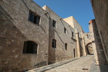 Street with historic buildings in the old town in Rhodes, Greece