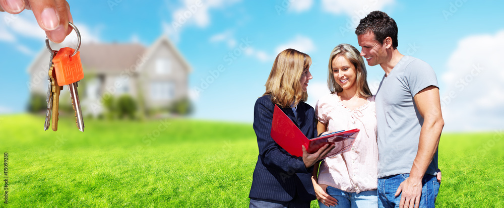 Canvas Prints Real Estate agent woman with clients near new house.