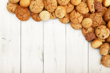 Cookies and biscuits at white wood with copy space