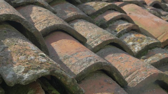 Roofing ancient materials made of clay 4K 2160p UHD panning footage - Roof top tiles made in old way 4K 3840X2160 UHD video 