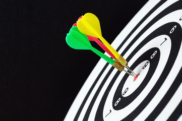 Three darts hits dartboard target