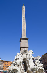 Fototapeta na wymiar Fountain of the Four Rivers (Fontana dei Quattro Fiumi) with Egyptian obelisk. Italy. Rome. Navon Square (Piazza Navona).