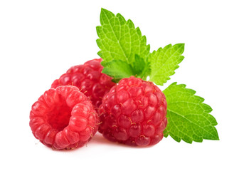 Raspberry with mint leaf. Closeup.