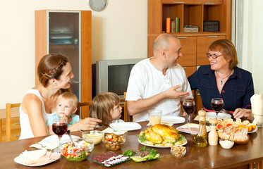 Obraz na płótnie Canvas Portrait of happy multigeneration family communicate over holida