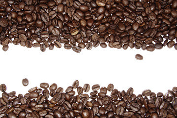 Roasted coffee beans on white. Copy space