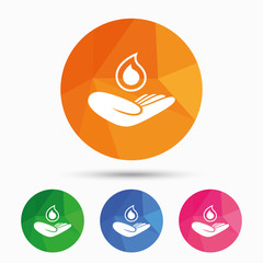 Obraz premium Save water sign. Hand holds water drop symbol