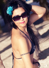 Naklejka premium portrait of woman relaxing on beach